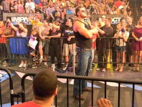 TNA fans on their feet (due to lack of chairs)
