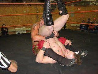 Wrestling match somehow won by sunset flip