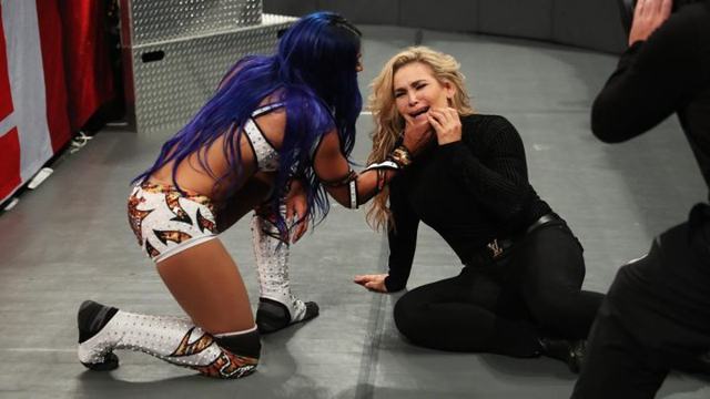 Who is the blue-haired mystery woman who attacked Natalya? We explore four theories!