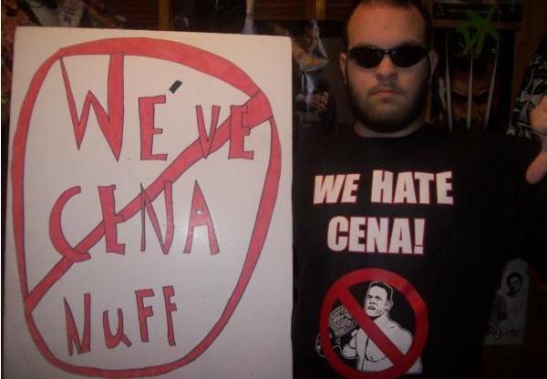 Guy with “Cena Nuff” sign has never “Cena woman naked”