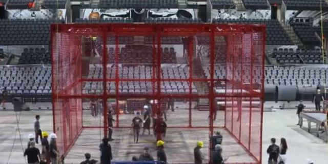 Here’s the REAL reason WWE’s Hell in a Cell cage is now red