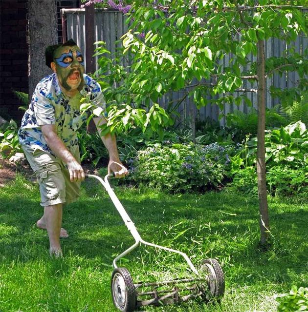 Mysterious wrestler does yard work in Parts Unmown