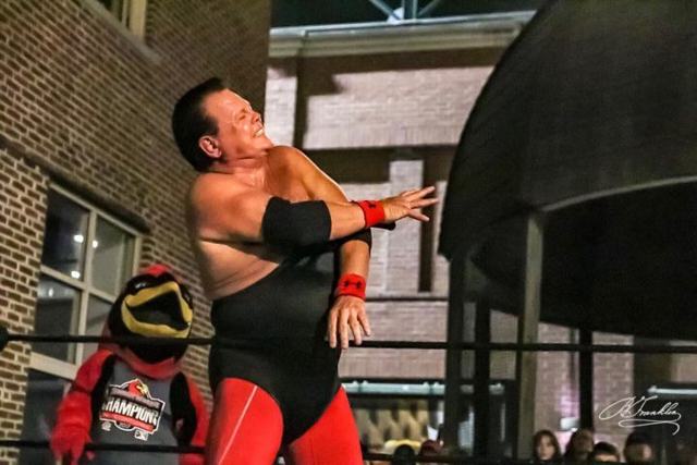 Science proves lowering singlet straps increases wrestler’s power