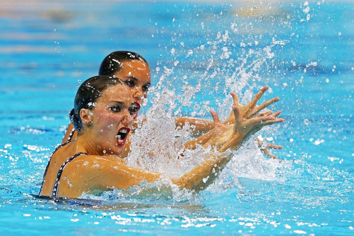 Synchronized swimmer calls pro wrestling a “silly choreographed spectacle”