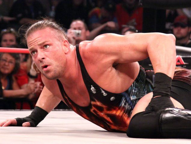 Rob Van Dam performs Two-Star Frog Splash