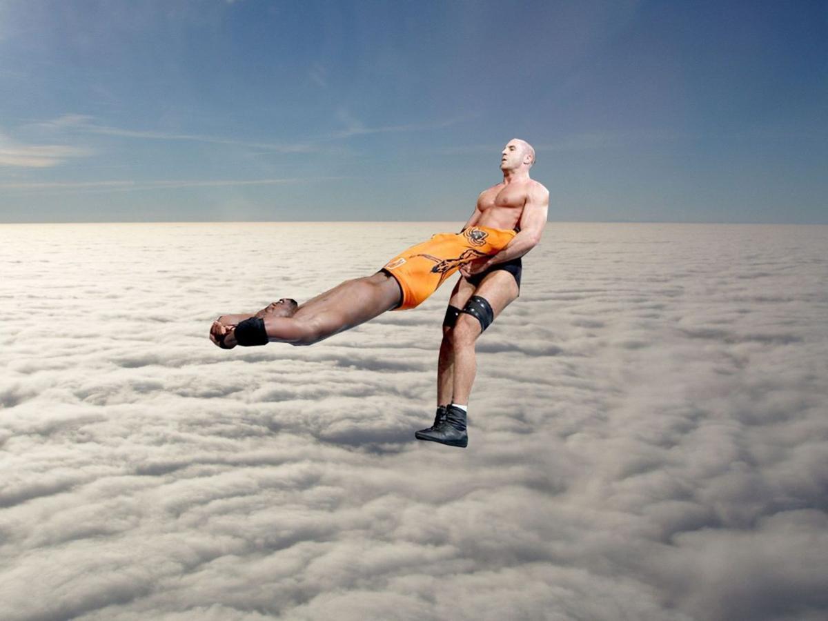 Cesaro and opponent take flight