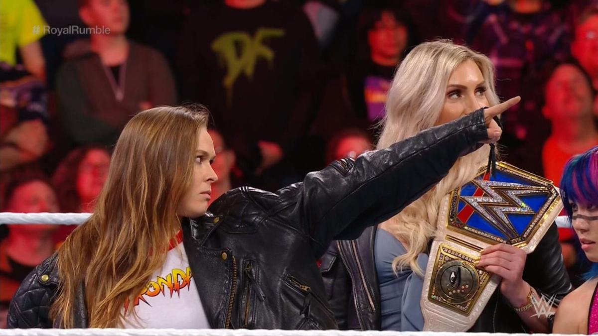 Rousey insists she was just pointing at a friend sitting near the WrestleMania sign